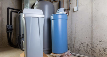 water softeners installed in a basement of a home