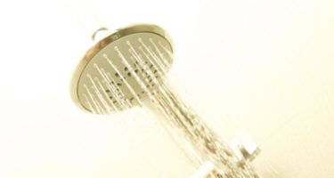 shower head that has a constant stream of water coming from it