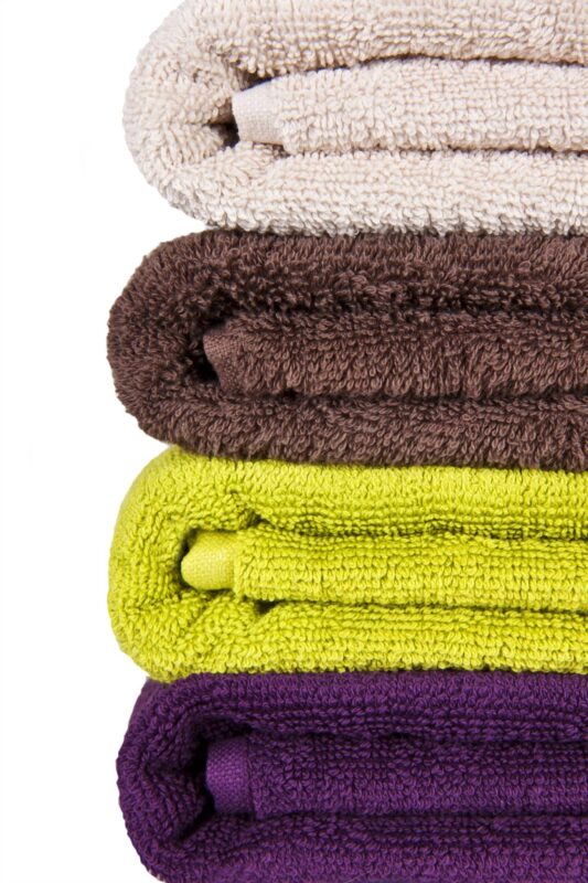 towels that are ready to be used by the shower