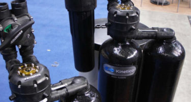 kinetico water softeners on display at a conference