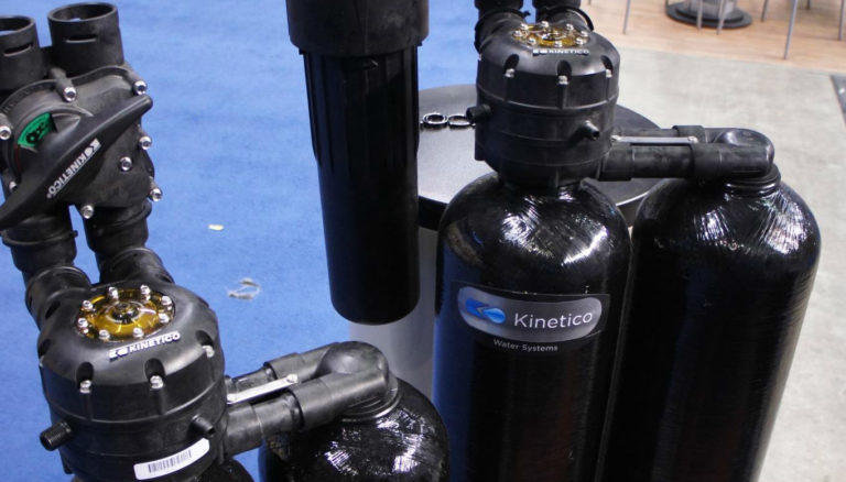 kinetico water softeners on display at a conference