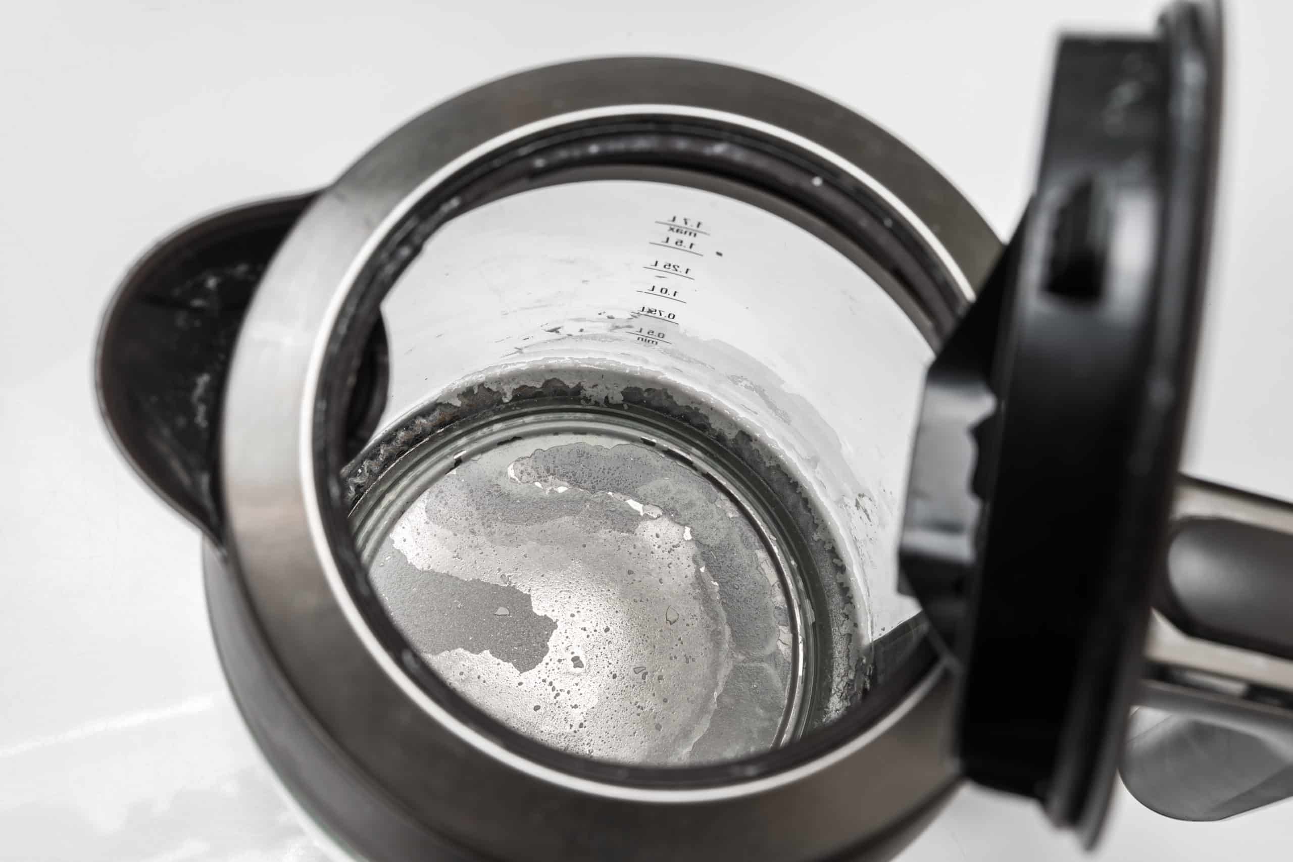 hard water stains left at the bottom of a kettle