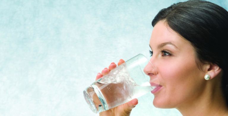 woman drinking purified water